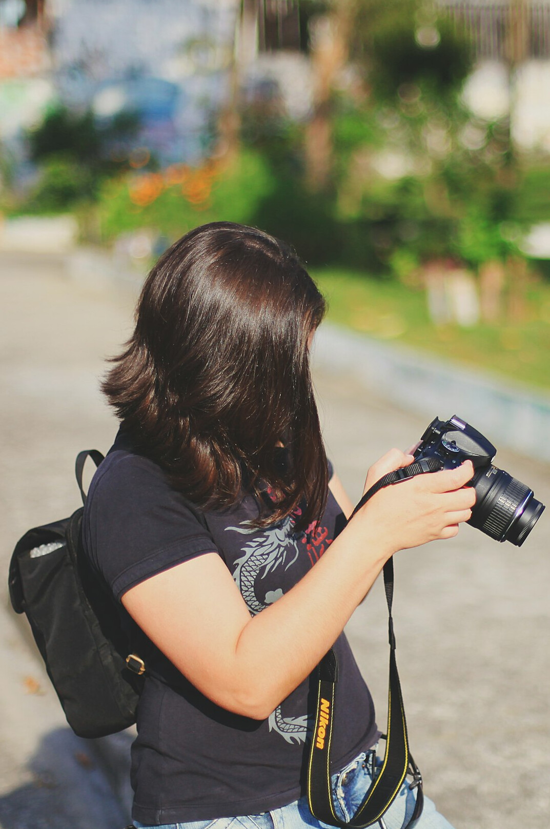 Chilean street photographer with camera on a busy sidewalk